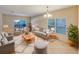 Spacious living room featuring a plush sofa and comfortable armchairs at 4718 Rockvale Dr, Kissimmee, FL 34758