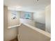 Open loft area with window overlooking the community at 4718 Rockvale Dr, Kissimmee, FL 34758