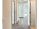 Upstairs hallway with neutral walls and carpeted floors at 4718 Rockvale Dr, Kissimmee, FL 34758