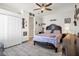 Bright bedroom with double doors and tiled floor at 6167 Hedgesparrows Ln, Sanford, FL 32771