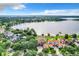 Stunning aerial view of waterfront property, showcasing expansive lake views at 6245 Little Lake Sawyer Dr, Windermere, FL 34786