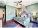 Bright bedroom with king-size bed and en-suite bathroom at 6245 Little Lake Sawyer Dr, Windermere, FL 34786