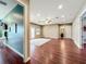 Spacious bedroom with hardwood floors and access to balcony at 6245 Little Lake Sawyer Dr, Windermere, FL 34786