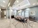 Formal dining room with large table, neutral decor, and plenty of natural light at 6245 Little Lake Sawyer Dr, Windermere, FL 34786