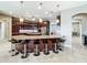 Island kitchen with granite countertops and stainless steel appliances at 6245 Little Lake Sawyer Dr, Windermere, FL 34786
