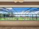 Stunning lake view from screened-in balcony with access to a dock at 6245 Little Lake Sawyer Dr, Windermere, FL 34786