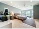 Spacious main bedroom with large windows, and a sitting area at 6245 Little Lake Sawyer Dr, Windermere, FL 34786