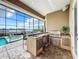 Stainless steel outdoor kitchen with granite countertops overlooking the pool at 6245 Little Lake Sawyer Dr, Windermere, FL 34786