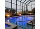 Stunning pool and spa with fire features and lake view at 6245 Little Lake Sawyer Dr, Windermere, FL 34786