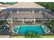 Enclosed pool and patio area with seating and fountains at 6245 Little Lake Sawyer Dr, Windermere, FL 34786