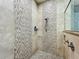 Spa-like shower with mosaic tile and modern fixtures at 6245 Little Lake Sawyer Dr, Windermere, FL 34786