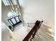 Elegant staircase with wrought iron railing and tiled flooring at 6245 Little Lake Sawyer Dr, Windermere, FL 34786