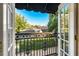 Balcony with wrought iron railings and neighborhood view at 805 Hamilton Place Ct, Winter Park, FL 32789