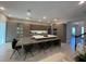Modern kitchen with large island, stainless steel appliances, and ample cabinetry at 8192 Ludington Cir, Orlando, FL 32836