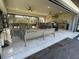 Modern outdoor kitchen with stainless steel appliances and ample counter space at 8192 Ludington Cir, Orlando, FL 32836