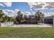 Relaxing pool area with a spacious deck and lush landscaping at 8192 Ludington Cir, Orlando, FL 32836