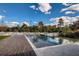 Inviting swimming pool with a large deck and stunning backyard views at 8192 Ludington Cir, Orlando, FL 32836