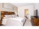 Primary bedroom with king bed and ensuite access at 8953 Shine Dr, Kissimmee, FL 34747
