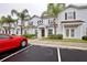 Townhomes with landscaping and parking at 8953 Shine Dr, Kissimmee, FL 34747