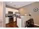 Modern kitchen with stainless steel appliances and breakfast bar at 8953 Shine Dr, Kissimmee, FL 34747