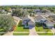 Aerial view of a house and neighborhood, showcasing the property's location at 1005 Cherry Valley Way, Orlando, FL 32828