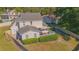 House back view showing patio and fenced backyard at 1250 Woodridge Ct, Altamonte Springs, FL 32714