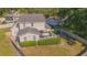 House back view showing patio and fenced backyard at 1250 Woodridge Ct, Altamonte Springs, FL 32714