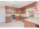 Modern kitchen featuring stainless steel appliances and ample cabinetry at 1250 Woodridge Ct, Altamonte Springs, FL 32714