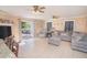 Spacious living room with access to a deck and plenty of natural light at 1250 Woodridge Ct, Altamonte Springs, FL 32714