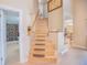 Elegant wooden staircase leading to the upper level at 1250 Woodridge Ct, Altamonte Springs, FL 32714