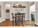 Kitchen breakfast nook with a wooden table and four chairs at 1619 Cherry Blossom Ter, Lake Mary, FL 32746