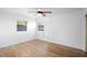Well lit bedroom with hardwood floors and ceiling fan at 1621 Puritan,, Winter Park, FL 32792