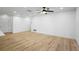 Spacious living room with light hardwood floors and ceiling fan at 1621 Puritan,, Winter Park, FL 32792