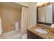 Clean bathroom with tub, shower, and granite countertop at 201 Arbor Cir, Sanford, FL 32773