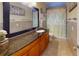 Clean bathroom with granite countertop, shower, and updated vanity at 2032 Dumas Dr, Deltona, FL 32738