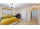 Bright bedroom featuring a comfortable bed and built-in workspace at 2032 Dumas Dr, Deltona, FL 32738