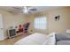 Serene bedroom with a comfortable bed and a dresser at 2032 Dumas Dr, Deltona, FL 32738
