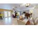 Dining room with a view of the living room and fireplace at 2032 Dumas Dr, Deltona, FL 32738