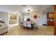 Bright dining room with kitchen and entryway views at 2032 Dumas Dr, Deltona, FL 32738