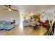 Bright and airy living room with comfortable seating and neutral tones at 2032 Dumas Dr, Deltona, FL 32738