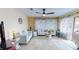Spacious living room with comfy sofas and tile floors at 2032 Dumas Dr, Deltona, FL 32738