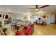 Spacious living area featuring a dining area and comfy seating at 2032 Dumas Dr, Deltona, FL 32738