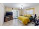 Main bedroom with private access to the backyard at 2032 Dumas Dr, Deltona, FL 32738