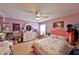 bedroom with a pink bed frame and various themed decor at 3890 Kruger Rand Cv, Sanford, FL 32771