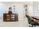 Home office with built-in shelving and a view into hallway at 3905 Angola Ln, Sanford, FL 32771