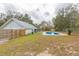 Large backyard with a refreshing pool at 4 Cedar Trace Way, Ocala, FL 34472