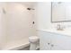 Updated bathroom with modern vanity, shower, and toilet at 4 Cedar Trace Way, Ocala, FL 34472