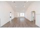 Open concept living room with high ceilings and vinyl flooring at 4 Cedar Trace Way, Ocala, FL 34472