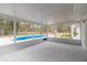 Screened porch overlooking the backyard pool at 4 Cedar Trace Way, Ocala, FL 34472