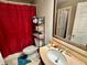 Clean bathroom with shower bathtub combo, toilet and vanity at 4142 Versailles Dr # 4142D, Orlando, FL 32808